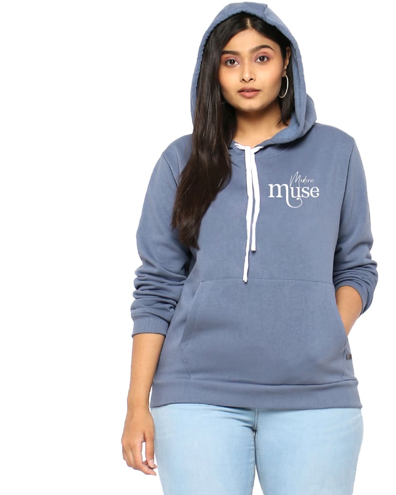Front of a model wearing a size 3XL Light Blue "Modern Muse" Hooded Sweatshirt in Dusty Blue by Instafab Plus. | dia_product_style_image_id:298338